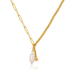 Elegant gold chain necklace adorned with a pearl pendant, showcasing a sophisticated multi-chain design.