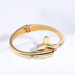 Stunning 18K gold-plated dolphin bangle, showcasing a unique hinged design that adds charm to any outfit.