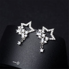 Elegant silver star earrings featuring a cluster of dazzling cubic zirconia diamonds.