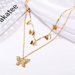 Dazzling 18K gold-plated necklace with butterfly charms, combining elegance and whimsy for a unique addition to your jewelry collection.