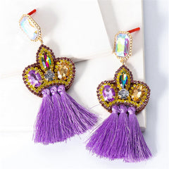 Eye-catching purple tassel earrings featuring crystals and beads, ideal for a bold and stylish statement.