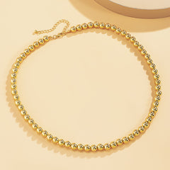 Beautifully crafted 18K gold-plated bead necklace, showcasing a single strand of luxurious gold beads.