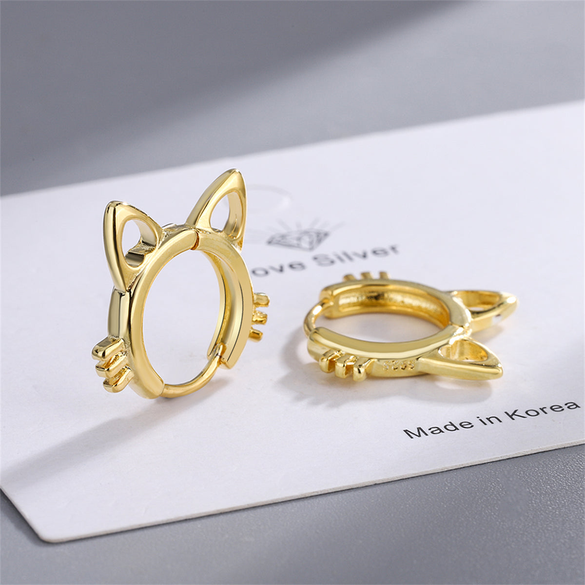 18K Gold-Plated Cat-Shape Huggie Earrings, gold huggie earrings, everyday style, detail close-up