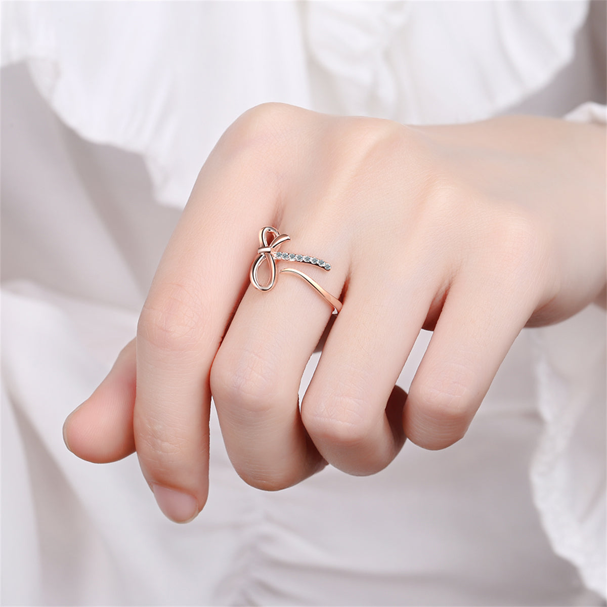 Cubic Zirconia and 18K Rose Gold-Plated Pavé Openwork Bow Bypass Ring, rose gold statement rings for women, lifestyle look