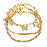 Elegant 18K gold-plated butterfly charm bracelet, showcasing a delicate chain adorned with shimmering butterfly accents.