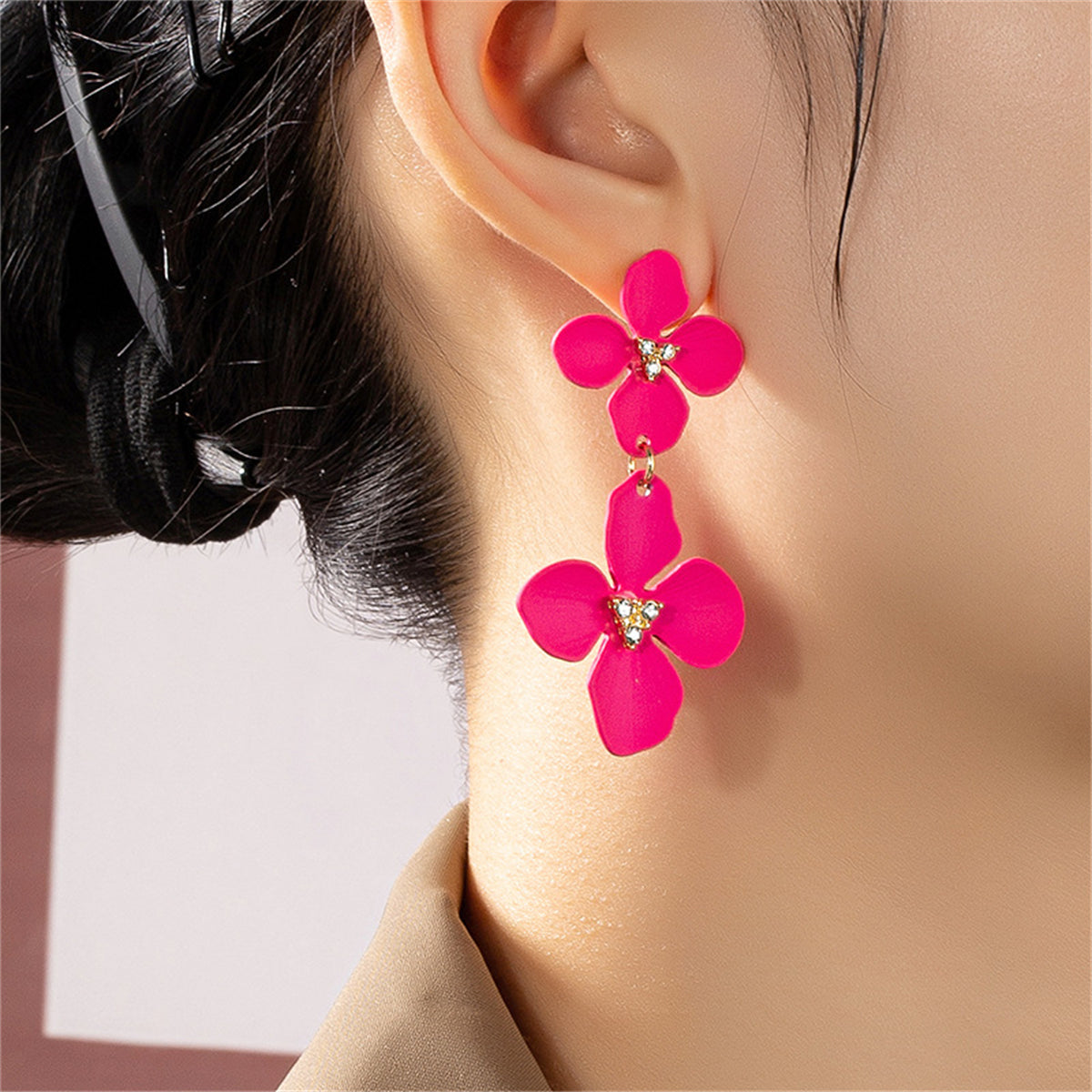 Hot pink flower earrings with crystal accents, featuring rose enamel and cubic zirconia on 18K gold-plated dangles.