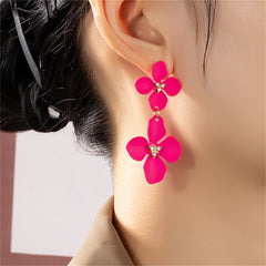Hot pink flower earrings with crystal accents, featuring rose enamel and cubic zirconia on 18K gold-plated dangles.