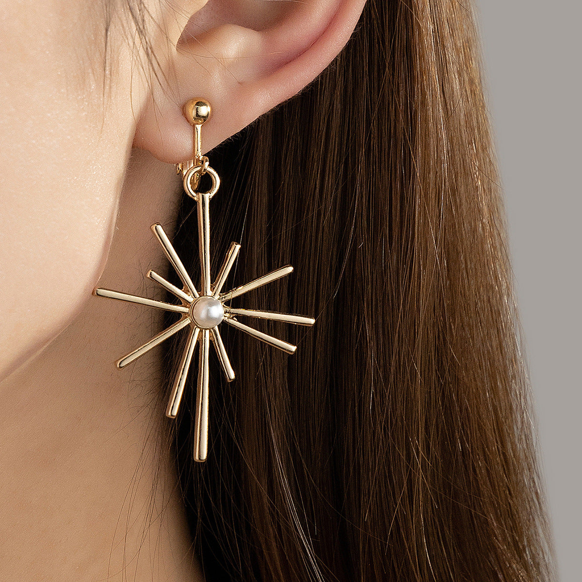 Pearl and 18K Gold-Plated Sunflower Huggie Earrings, gold huggie earrings, dainty minimalist design, styled look
