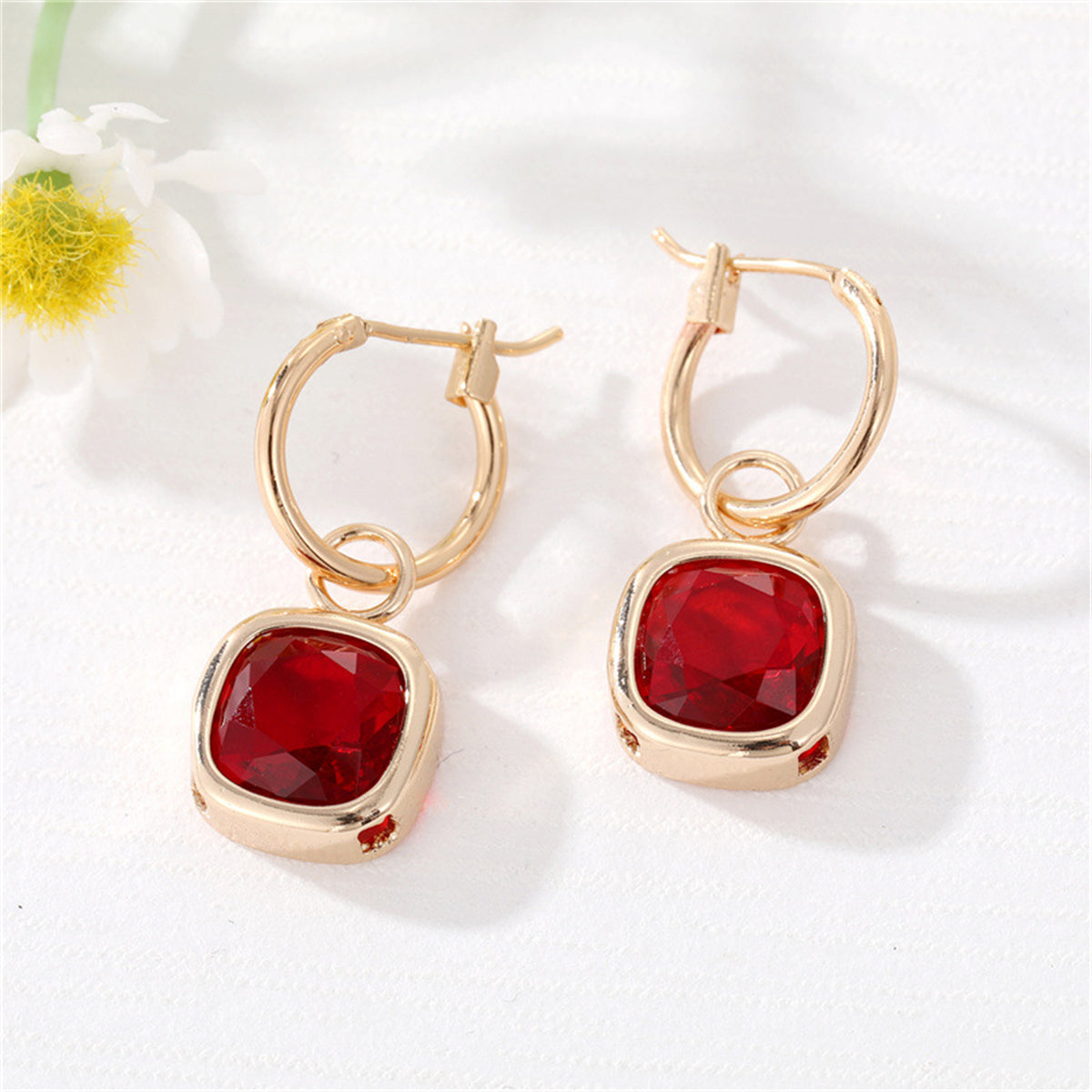Red Crystal and 18K Gold-Plated Cube Huggie Earrings, gold huggie earrings, botanical inspired, front view