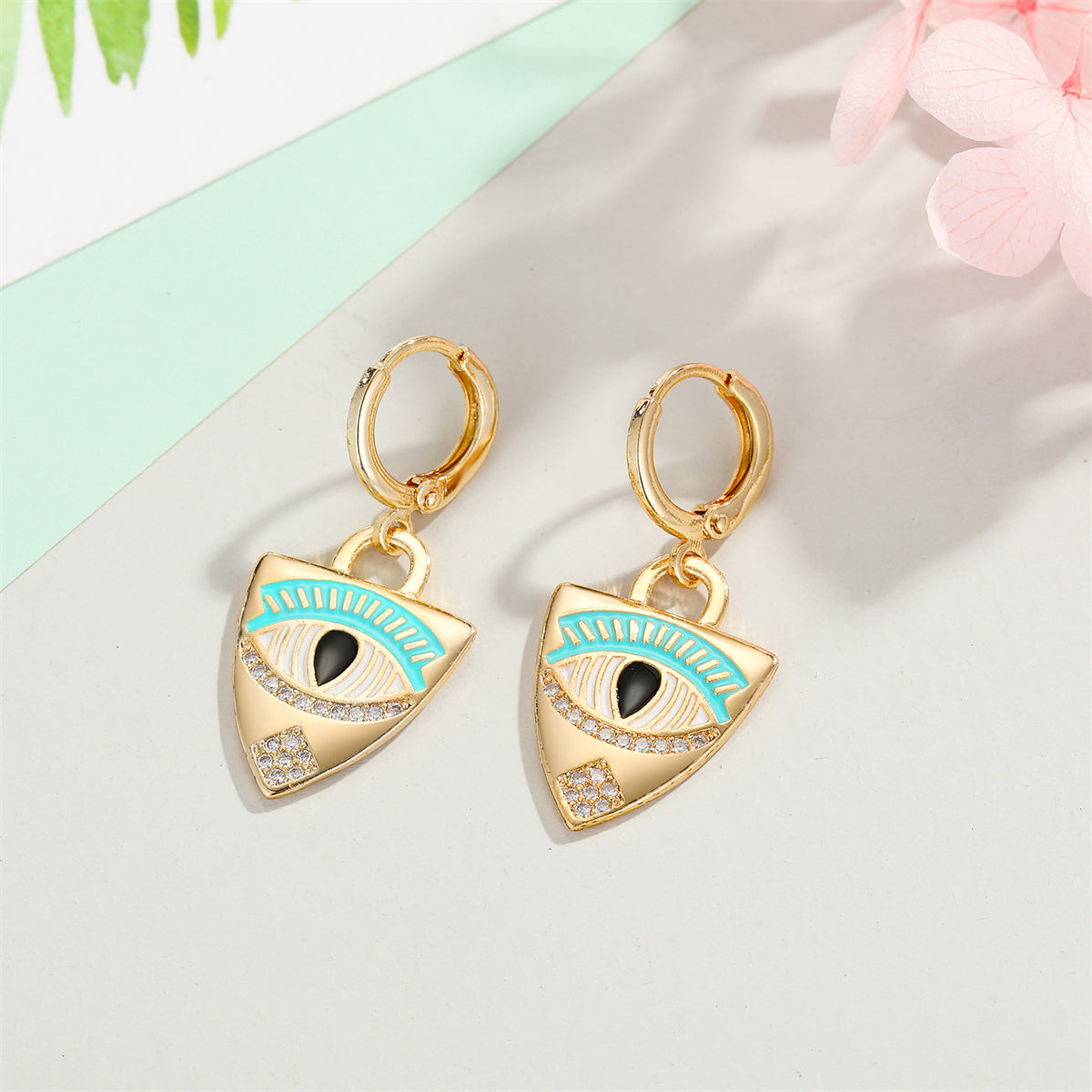 Cubic Zirconia and Enamel 18K Gold-Plated Eye Shield Drop Earring, gold huggie earrings, botanical inspired, lifestyle look