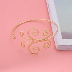 Stunning 18K gold-plated butterfly arm cuff, designed with a captivating spiral pattern, ideal for enhancing your outfit.