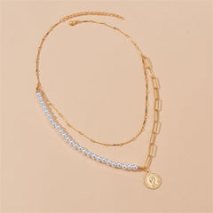 A stylish layered necklace with a pearl chain and an 18K gold-plated coin pendant, embodying elegance and luxury.