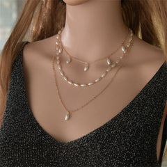 Elegant three-strand pearl necklace with 18K gold-plated accents, showcasing timeless sophistication and luxury.