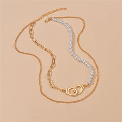 Two necklaces displayed together: a pearl necklace and a gold chain with a stylish 18K gold-plated handcuff pendant.