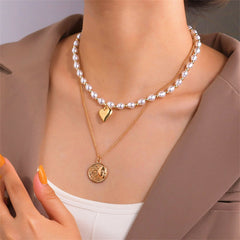 A layered necklace featuring an 18K gold-plated heart and sun coin design, elegantly crafted with pearls.