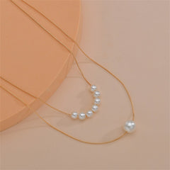 Elegant two-layer pearl necklace on a gold chain, highlighting the beauty of 18K gold-plated beads.