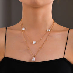 Stylish two-layer necklace adorned with pearls and an 18K gold-plated chain, perfect for enhancing any outfit.