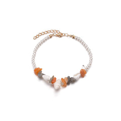 An exquisite 18K gold-plated anklet featuring a combination of orange quartz and white shell pearl stones.