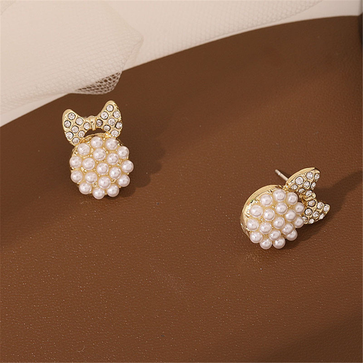 Cubic Zirconia and Pearl Bow Round Stud Earrings, stud earrings for women, vintage-inspired design, styled look