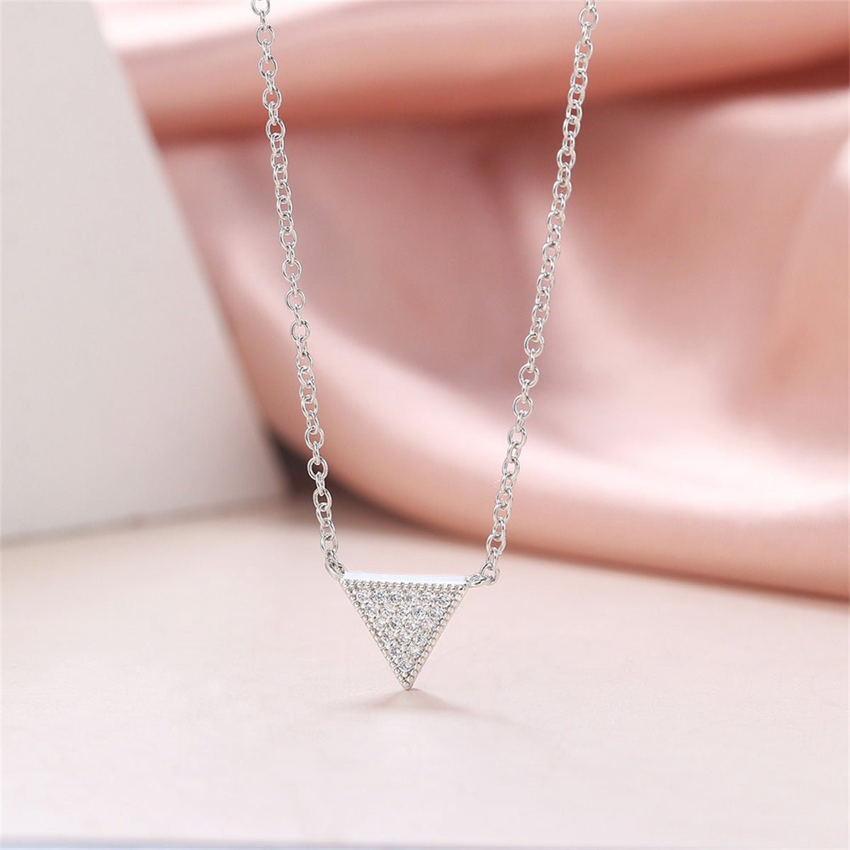 Cubic Zirconia and Silver-Plated Triangle Pendant Necklace, silver pendant necklace for women, botanical inspired, side view