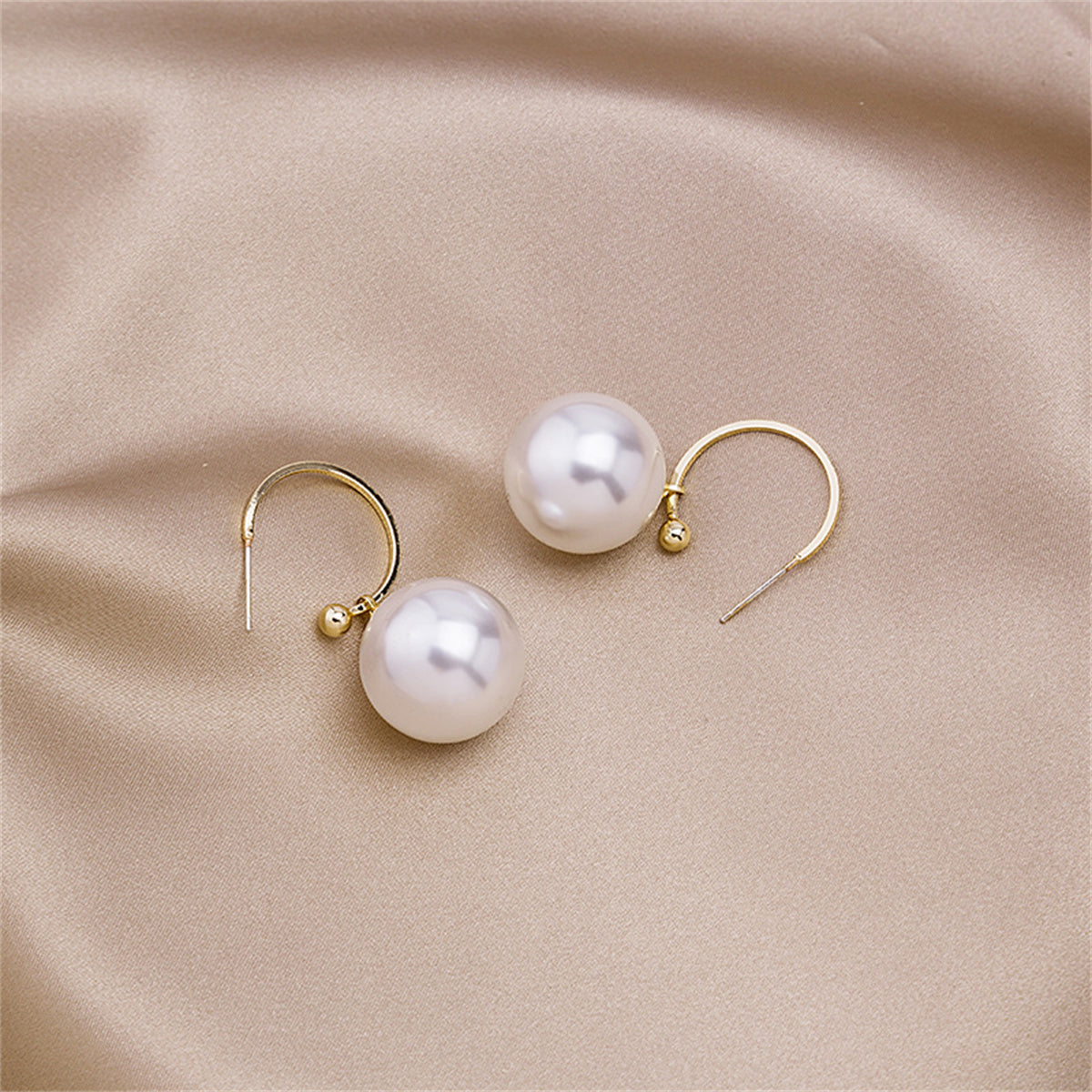 Pearl and 18K Gold-Plated Huggie Earrings, gold huggie earrings, everyday style, styled look