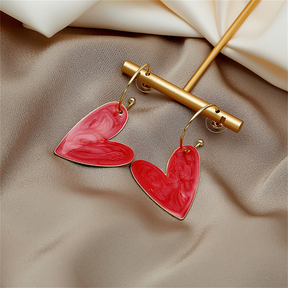 Red Enamel and 18K Gold-Plated Heart Huggie Earrings, gold huggie earrings, vintage-inspired design, detail close-up