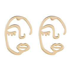 Stunning 18K gold-plated earrings with abstract face designs and detailed eyes, adding flair to any outfit.