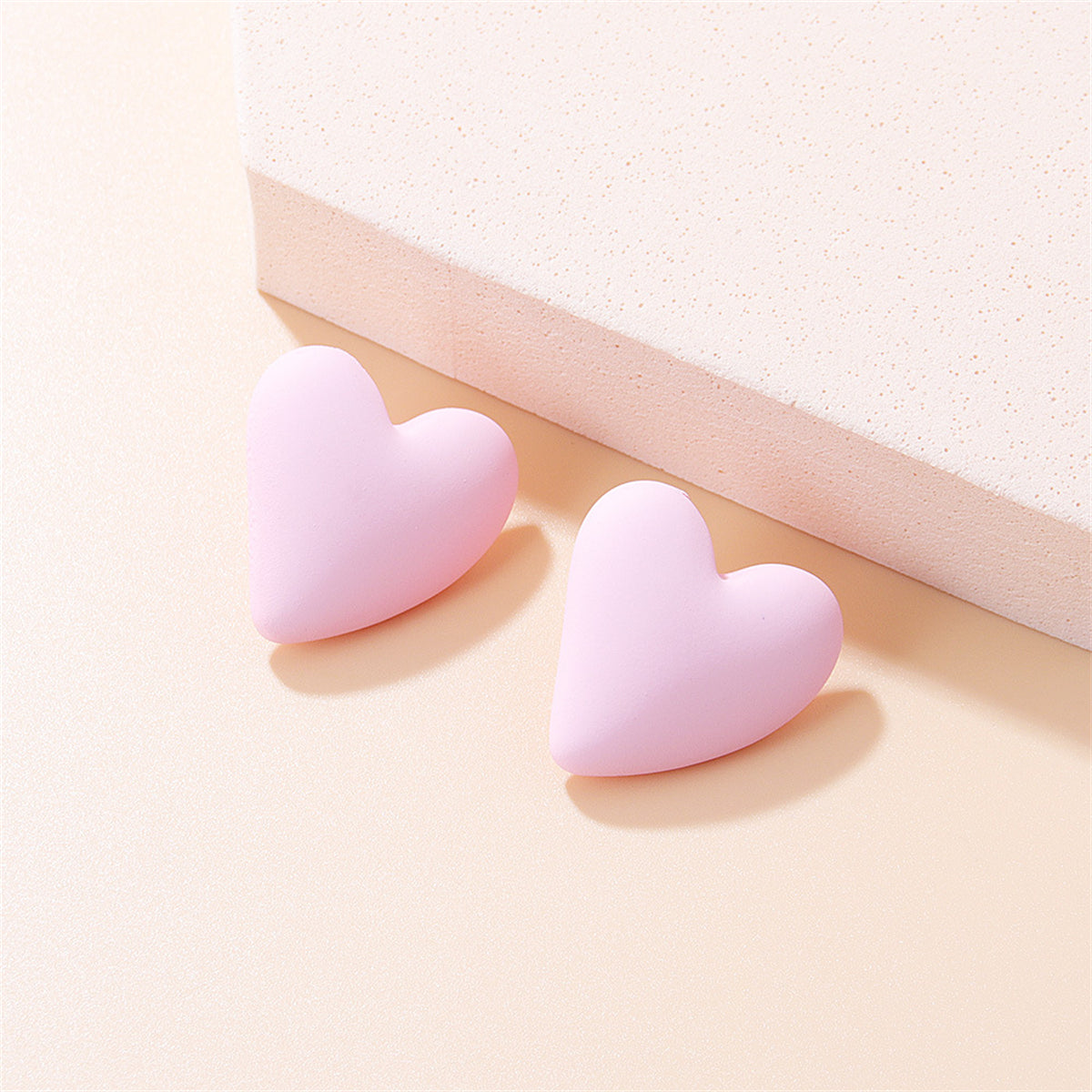 Light Pink Acrylic and Silver-Plated Heart Stud Earrings, silver stud earrings for women, vintage-inspired design, front view