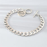 Silver-Plated 'Goods & Supplies' Curb Chain Toggle Bracelet