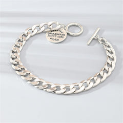 Silver-Plated 'Goods & Supplies' Curb Chain Toggle Bracelet