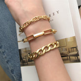 Three elegant 18K gold-plated chain bracelets featuring curb and cable designs, perfect for layering or standalone wear.