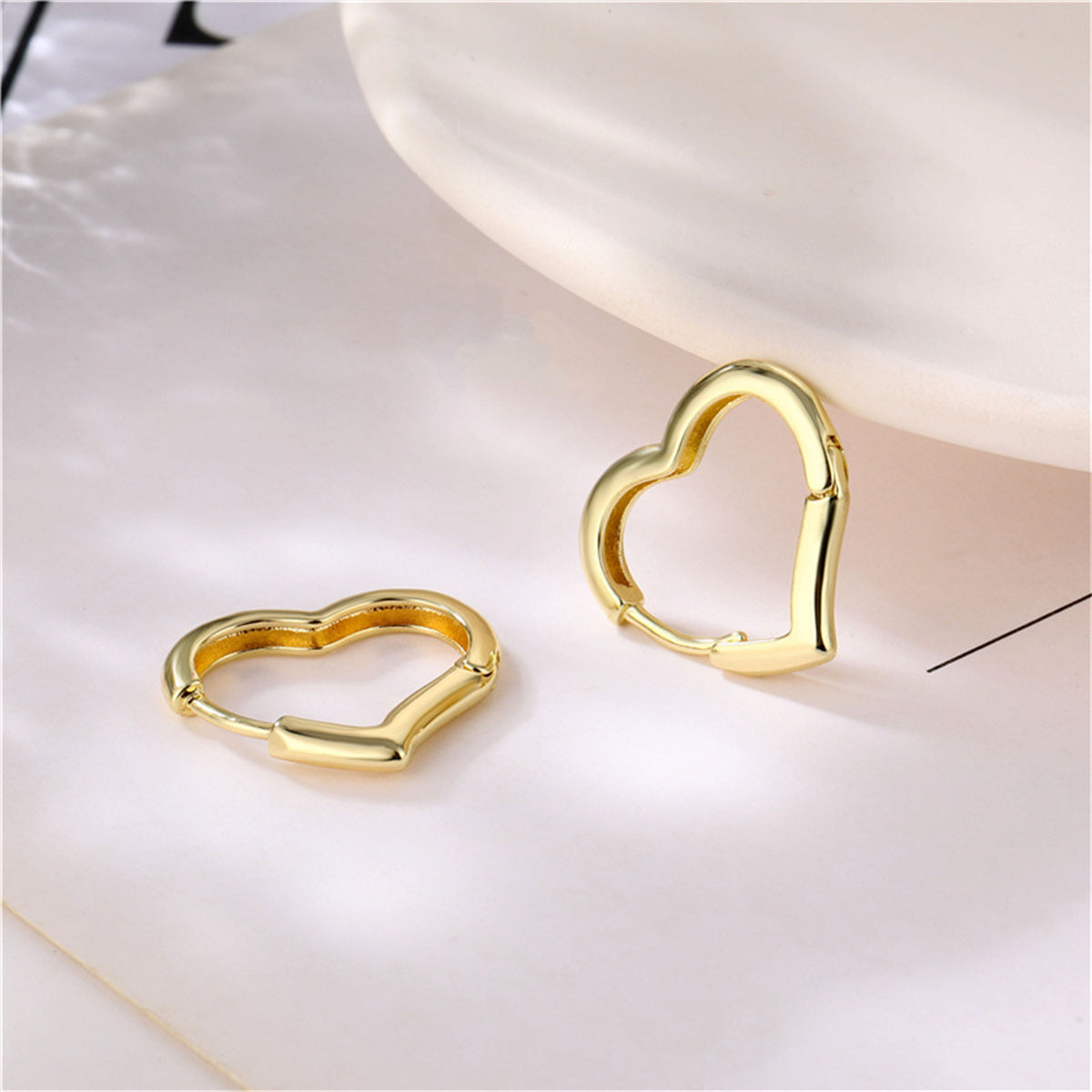 18K Gold-Plated Open Heart Huggie Earrings, gold huggie earrings, vintage-inspired design, detail close-up