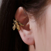 Elegant 18K gold-plated bee ear cuff featuring a beautifully detailed bee design, perfect for adding a touch of charm to any outfit.