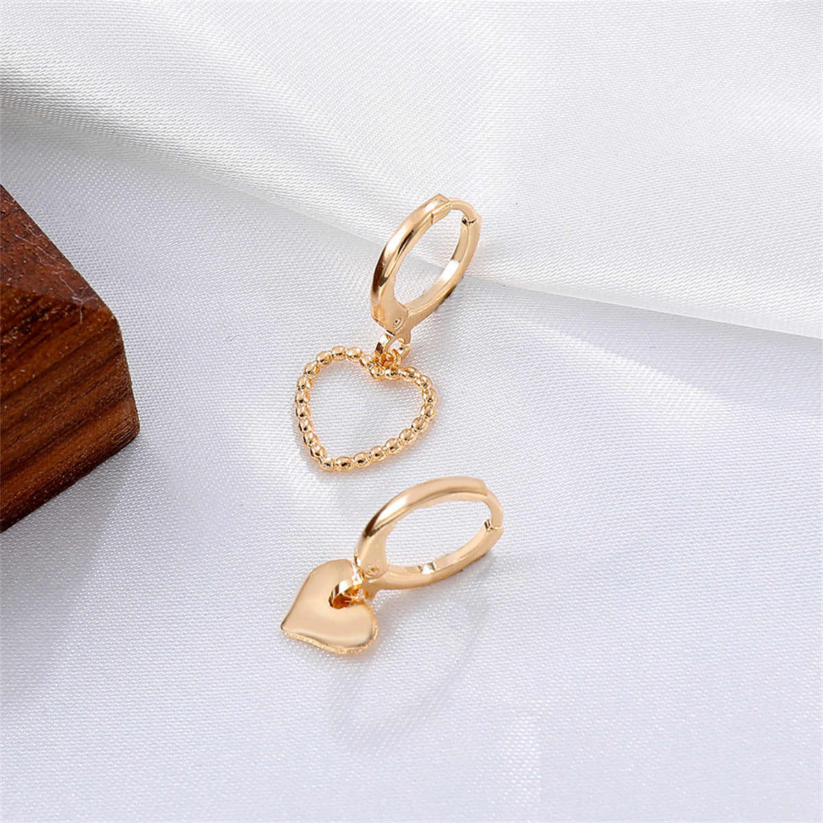 18K Gold-Plated Heart Mismatched Huggie Earrings, gold huggie earrings, elegant gift for her, detail close-up