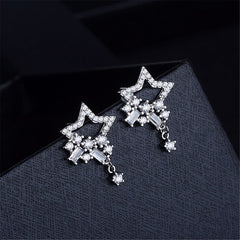 Silver star cluster drop earrings adorned with sparkling cubic zirconia diamonds.