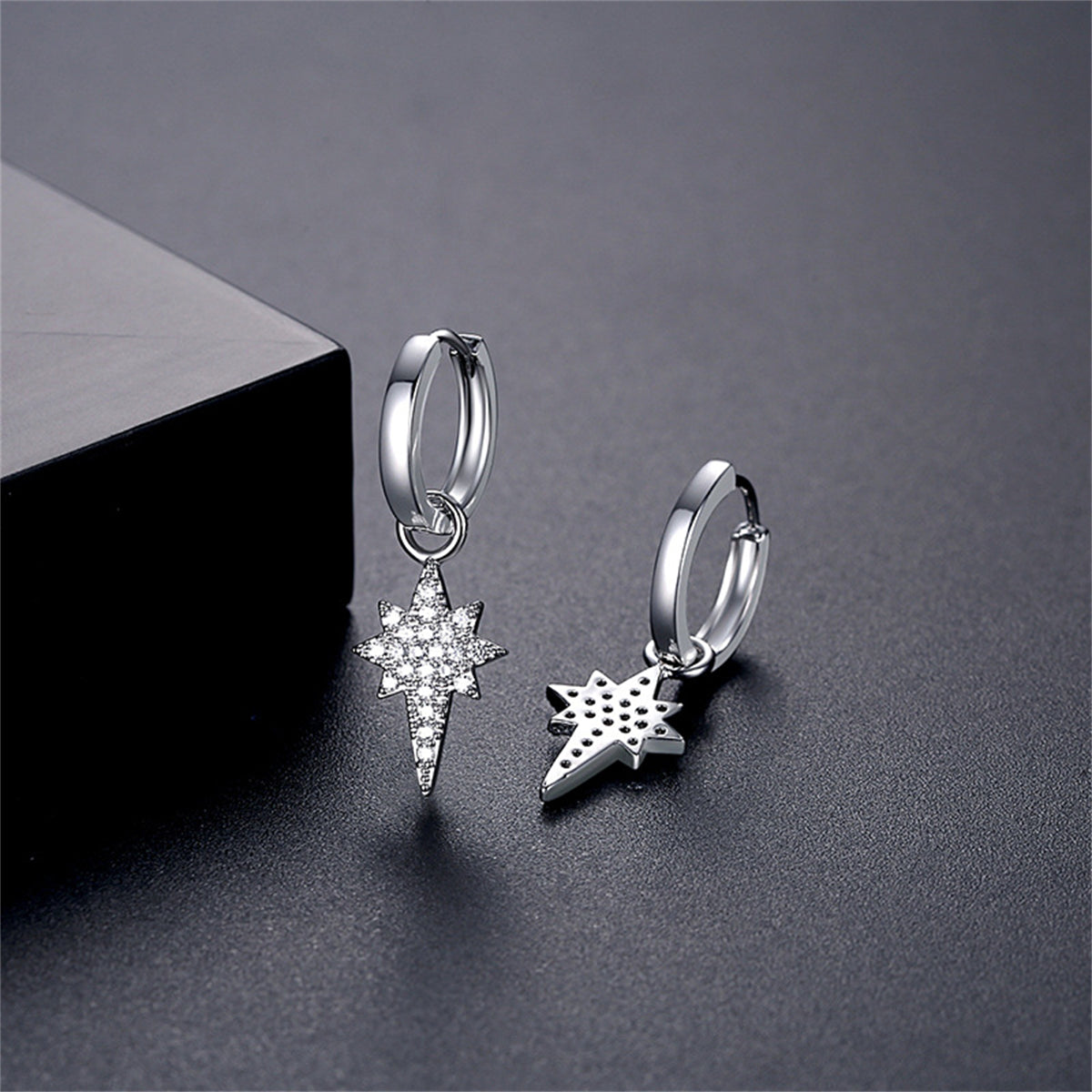 Cubic Zirconia and Silver-Plated Star Huggie Earrings, silver huggie earrings, botanical inspired, front view