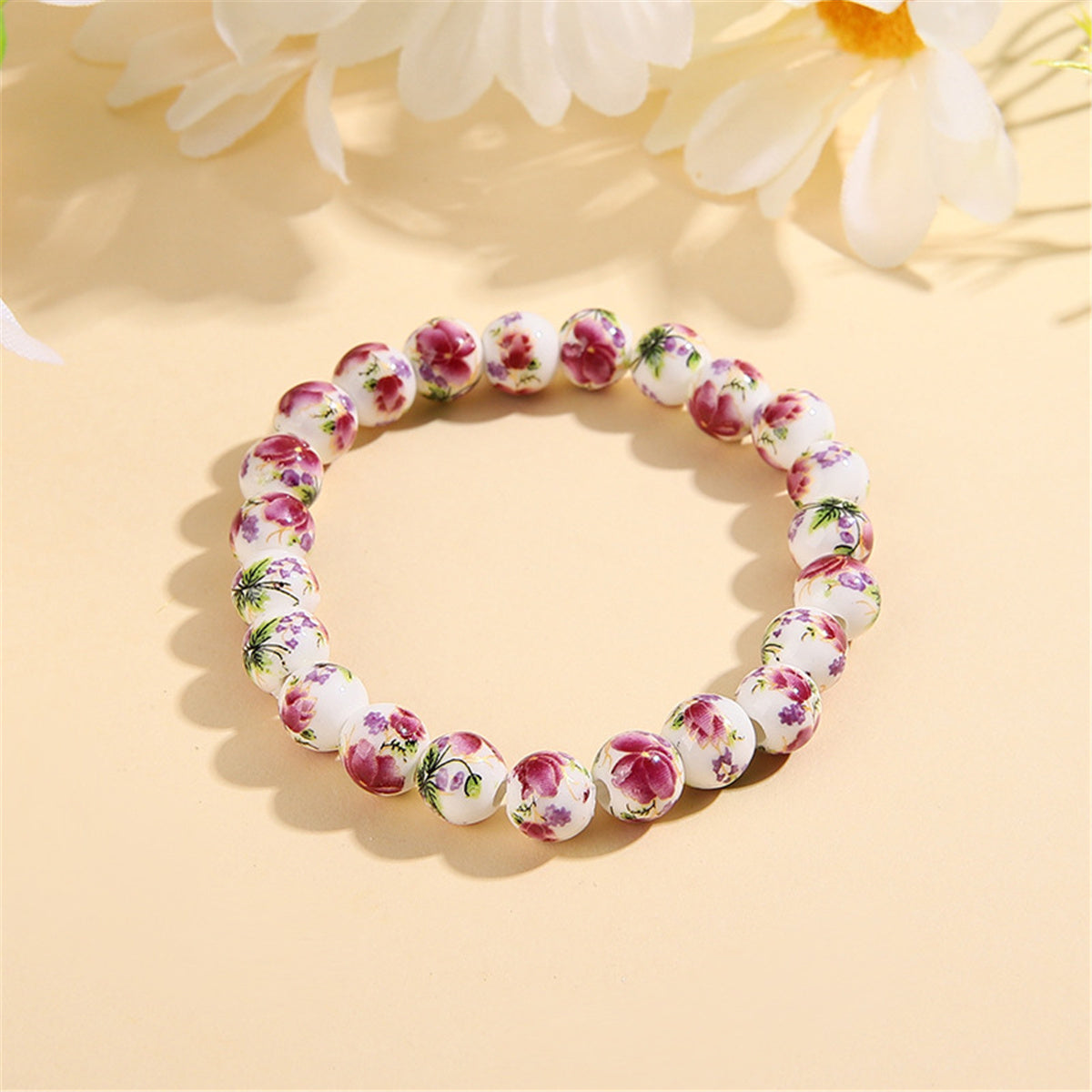 Purple and Ceramic Peony Beaded Stretch Bracelet, bracelet for women, dainty minimalist design, front view