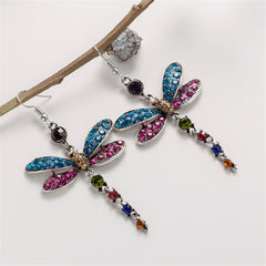 Eye-catching blue and pink crystal dragonfly earrings with silver plating, highlighting beautifully crafted wings.