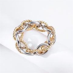 Two-tone bracelet featuring interlocked gold and silver twisted chain links in an oval design.