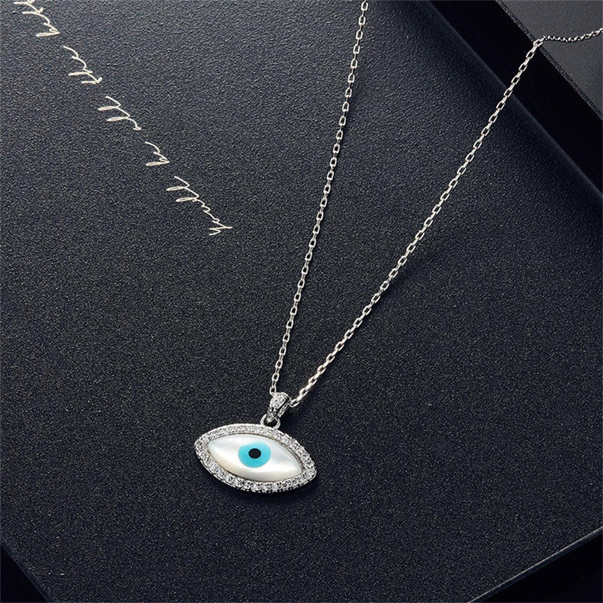 Cubic Zirconia and Silver-Plated Evil Eye Stud Earrings and Pendant Necklace, silver stud earrings for women, detail close-up