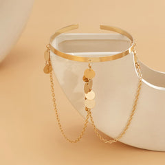 Stunning 18K gold-plated arm cuff with a chic chain design and coin details, perfect for elevating any outfit.