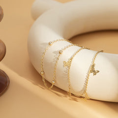 Stunning 18K gold-plated anklet featuring butterfly charms, a chic accessory to elevate any outfit effortlessly.