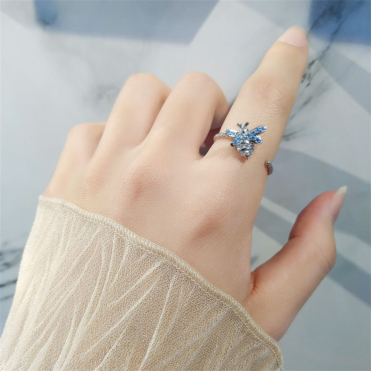 Cubic Zirconia and Silver-Plated Rotating Bee Open Ring, silver statement rings for women, lifestyle look