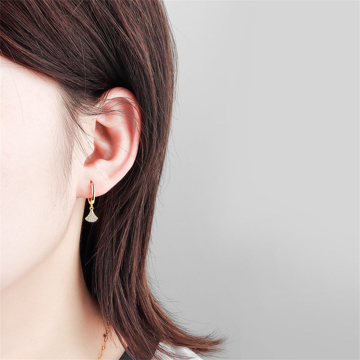 Cubic Zirconia and 18K Gold-Plated Fan Charm Huggie Earrings, gold huggie earrings, dainty minimalist design, styled look