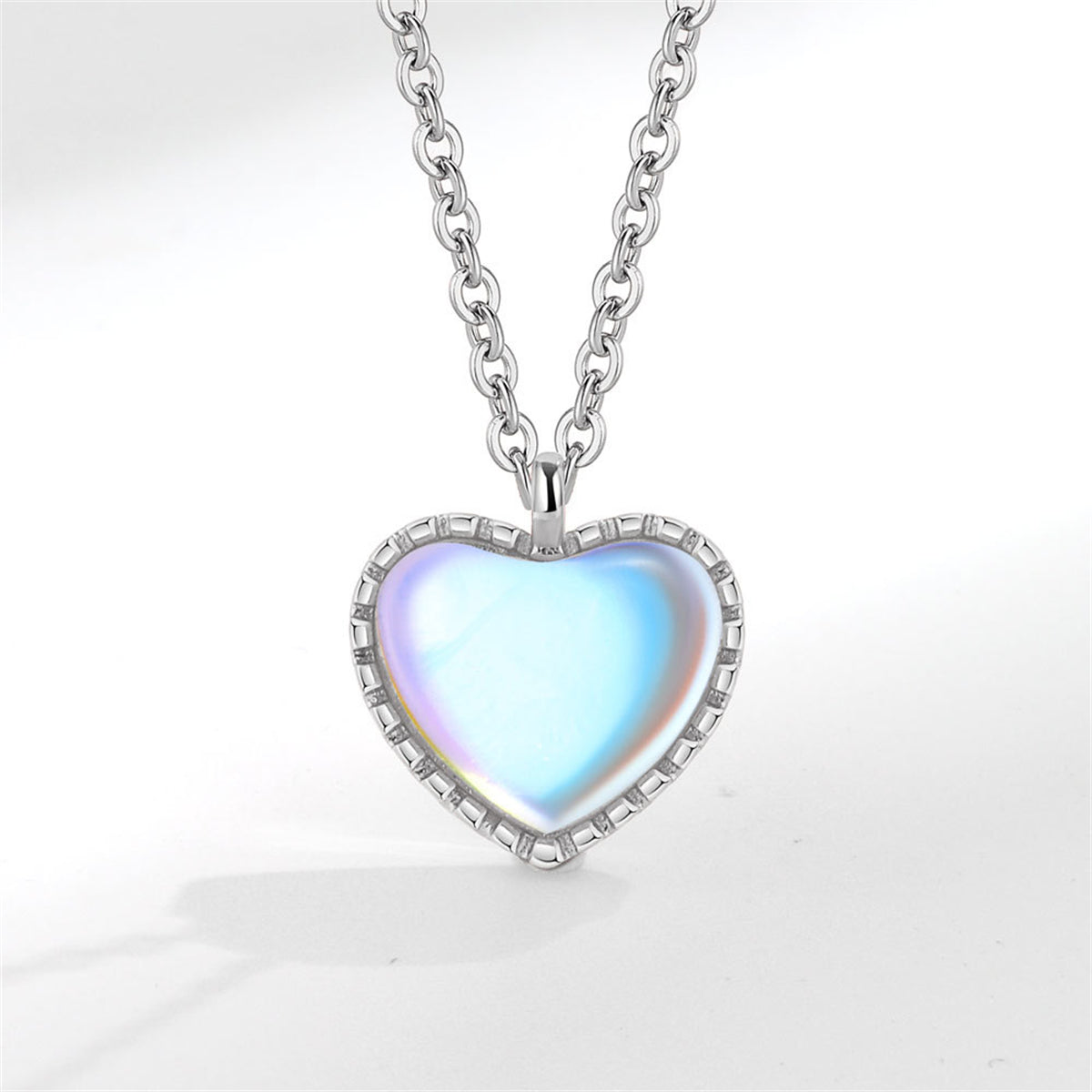 Moonstone and Silver-Plated Heart Pendant Necklace, silver pendant necklace for women, vintage-inspired design, front view