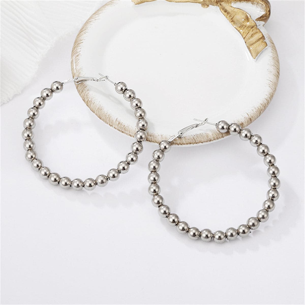 Silver-Plated Beaded Hoop Earrings, botanical inspired, front view
