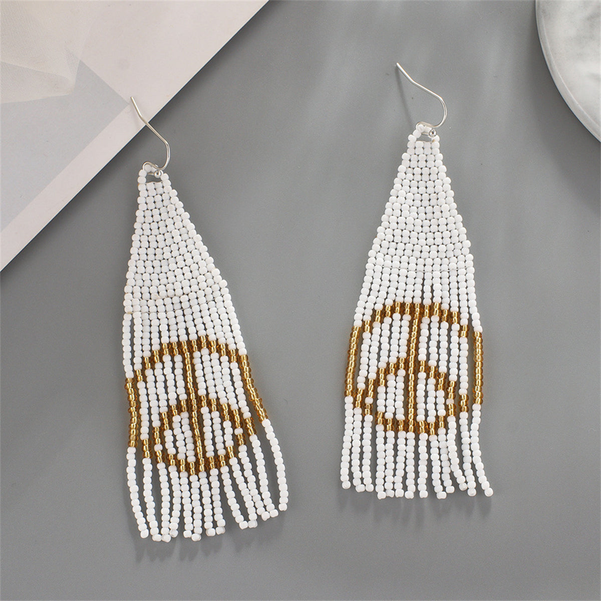 White Howlite Peace Sign Tassel Drop Earrings, drop earrings for women, vintage-inspired design, side view