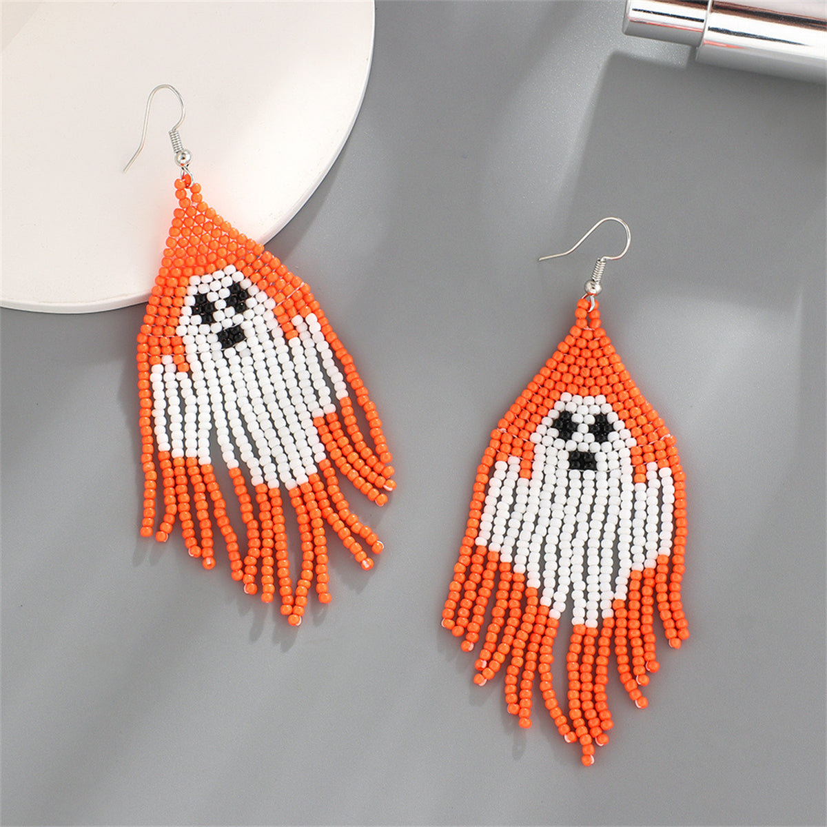 Orange Howlite and Silver-Plated Ghost Tassel Drop Earrings, silver drop earrings for women, botanical inspired, side view