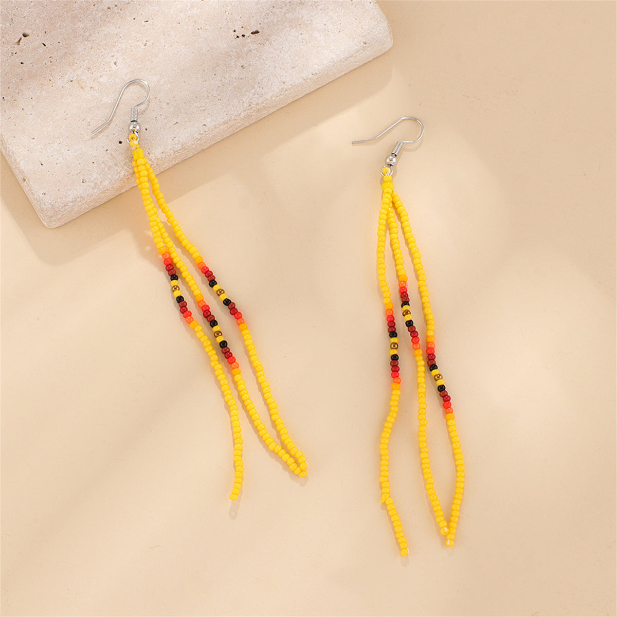 Yellow Howlite and Silver-Plated Tassel Drop Earrings, silver drop earrings for women, dainty minimalist design, side view