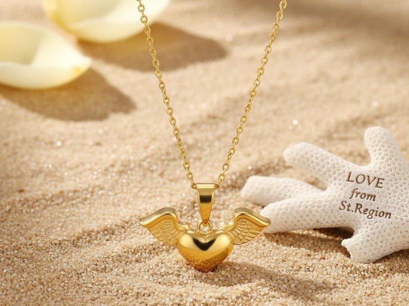 18K Gold-Plated Heart & Wings Pendant Necklace from St.Region photographed for the article Best Hypoallergenic Necklaces for Your Wedding Day.